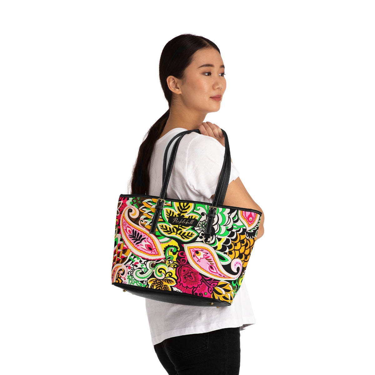 Woman with bright paisley Pickleball shoulder bag